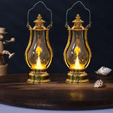 OBA LED retro oil lamp night light pair with gold finish on wooden surface